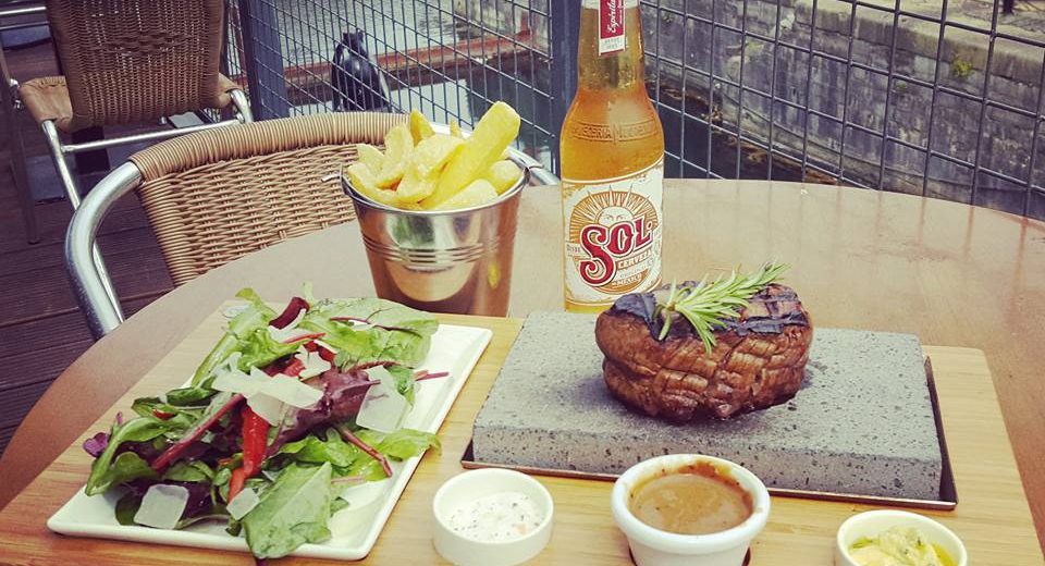 Sizzling Steak on a Stone with Chunky Handcut Chips & Peppered Sauce, Ballymaloe Relish & Garlic Butter