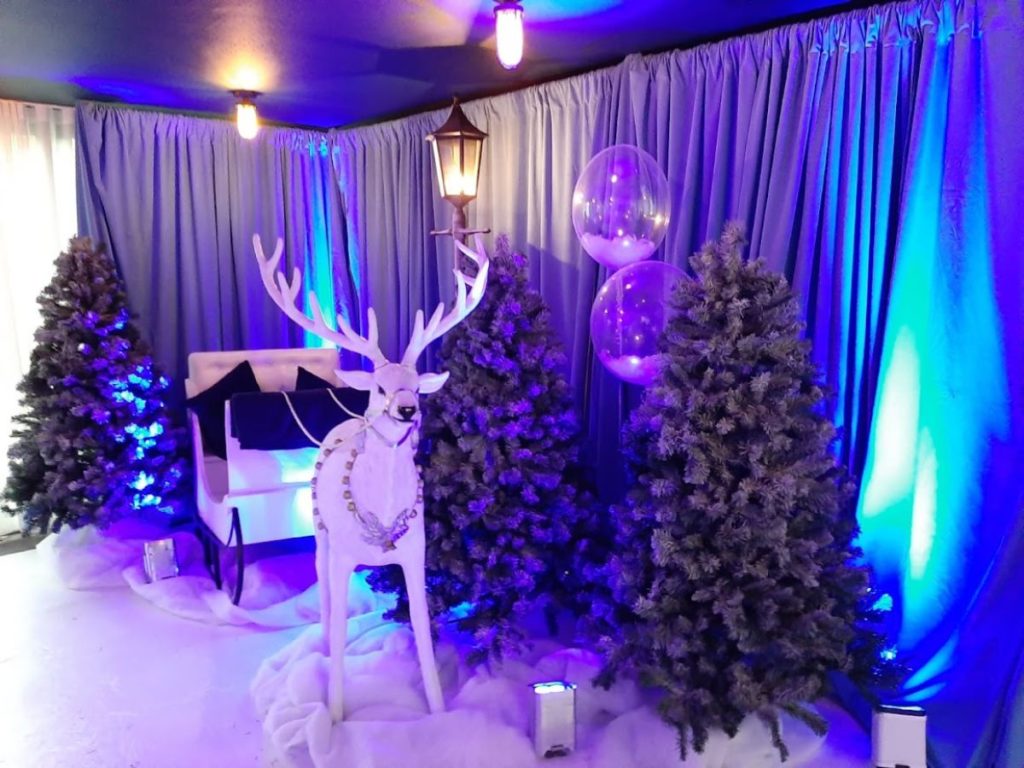 Reindeer and Christmas tree set up for Christmas party