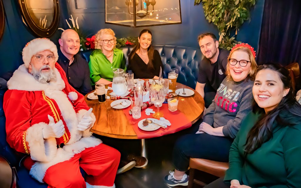 Harbourmaster Santa in restaurant booth